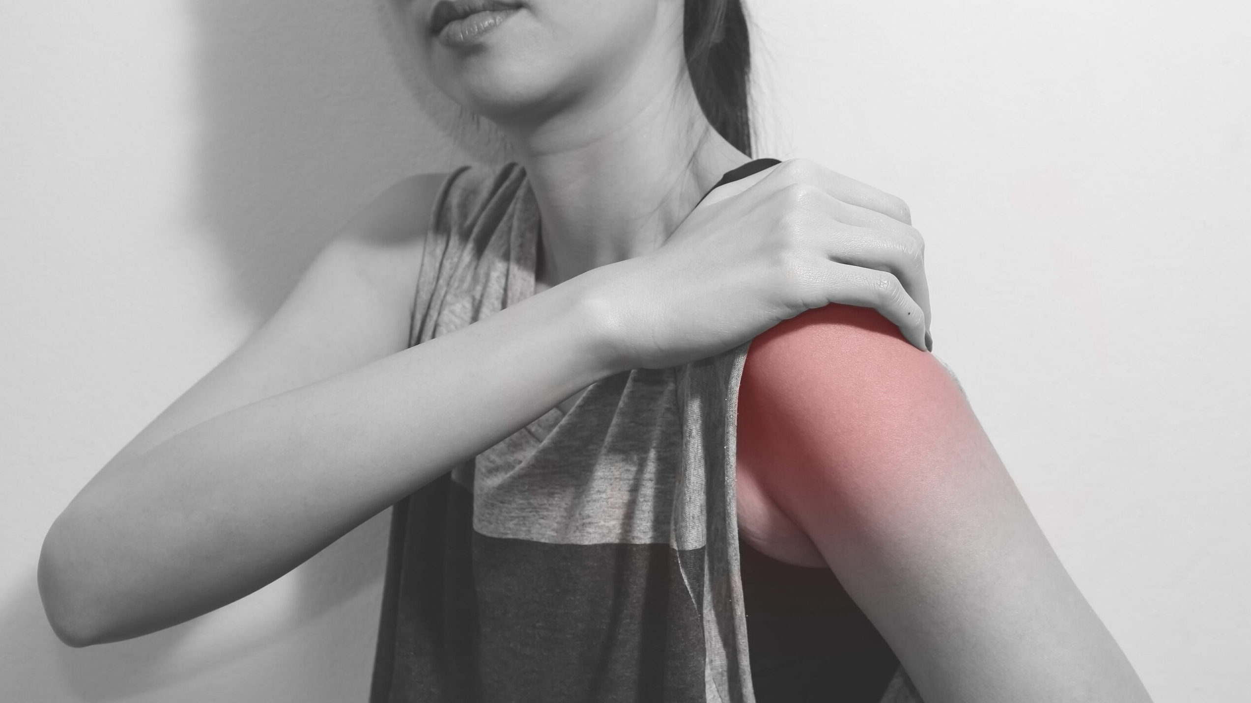 woman shoulder pain, monochrome